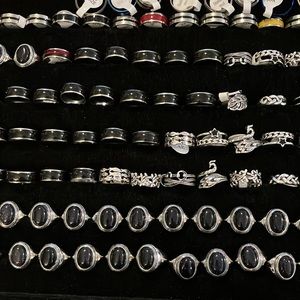 246 pc lot of assorted ladies/men’s rings, lots of stainless steel, last box
